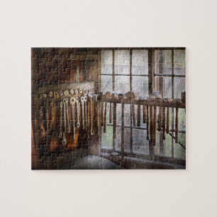 Puzzle Herrero - Planchas y martillos de dibujo