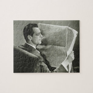 Puzzle Hombre de negocios que lee el periódico