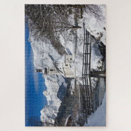 Puzzle Iglesia en la nieve con los Alpes