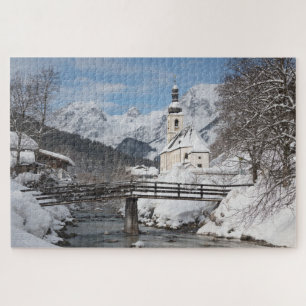 Puzzle Iglesia en la nieve con los Alpes en invierno