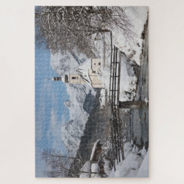 Puzzle Iglesia en la nieve con los Alpes en invierno