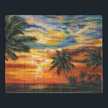 Puzzle Impresionante atardecer tropical<br><div class="desc">"Impresionante atardecer tropical II" por Carolee Vitaletti. Dispone de una puesta de sol contra los árboles y el agua en la playa.</div>