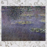 Puzzle Impresionismo vintage por Claude Monet<br><div class="desc">El Waterlilies de Claude Monet es un bonito cuadro de arte natural con lirios en un estanque en el jardín de Monet, su casa en Giverny, Francia. Un árbol cuelga sobre el estanque mientras el cielo está reflejando en el agua. Una serie de más de 250 pinturas con flores de...</div>