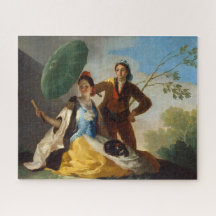 Joven sosteniendo un parasol para una dama adinera