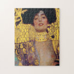 Puzzle Judith (Lady in Gold), Gustav Klimt<br><div class="desc">Gustav Klimt (14 de julio de 1862 - 6 de febrero de 1918) era un pintor simbolista austríaco y uno de los miembros más destacados del movimiento secesión de Viena. Klimt es conocido por sus pinturas, murales, bocetos y otros objetos artísticos. Además de sus obras figurativas, que incluyen alegorías y...</div>