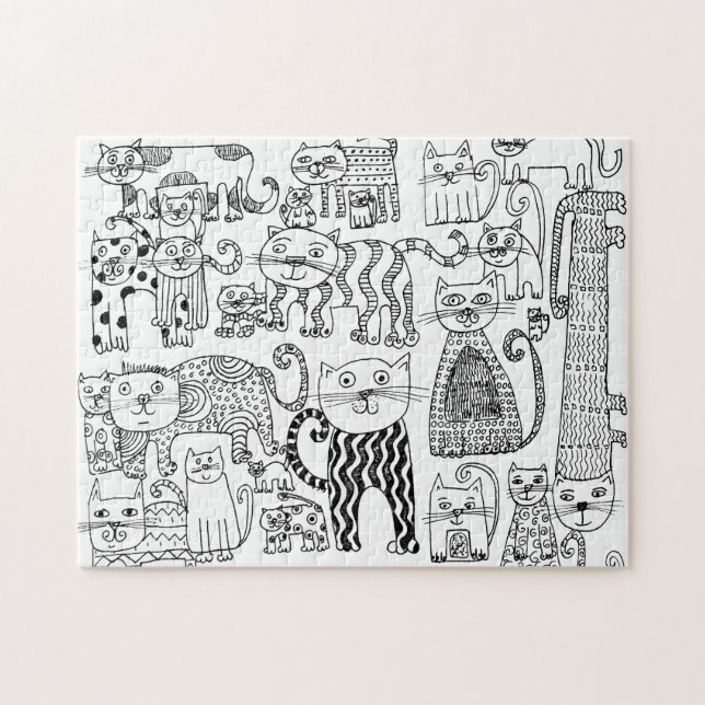 Puzzle La mano divertida de los gatos negros y blancos di (Horizontal)