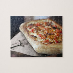Puzzle La pizza con los tomates, el ajo y la carne