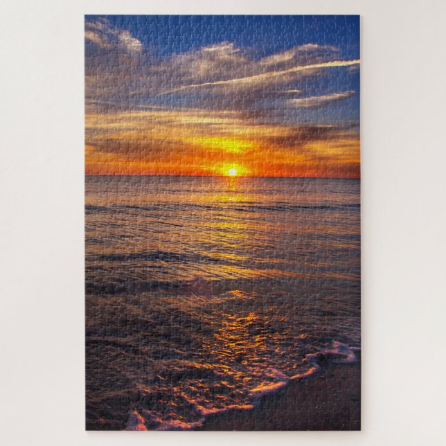 Puzzle La puesta de sol en la playa (Vertical)