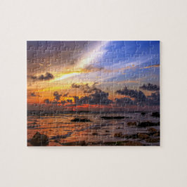 Puzzle La puesta de sol en la playa