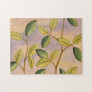 Puzzle Las hojas verdes y amarillas en el fondo del atard