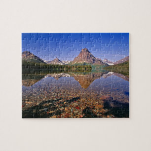 Puzzle Las montañas se reflejan en el tranquilo lago de 