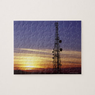 Puzzle Las telecomunicaciones mast en la puesta del sol