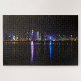 Puzzle Línea aérea de la iluminada Doha, Qatar de noche