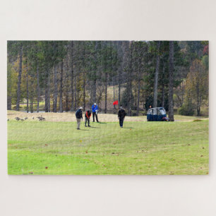 Puzzle Los golfistas al poner verde