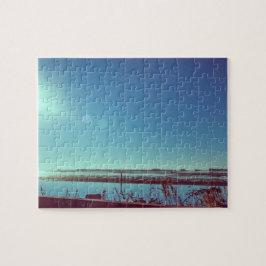 Puzzle Los rayos de sol sobre la laguna azul