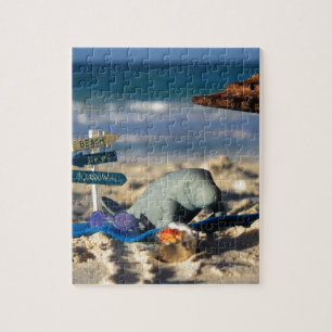 Puzzle Manfred el Manatee en la playa