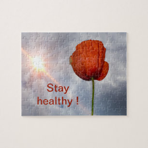 Puzzle Mantente saludable con flor roja
