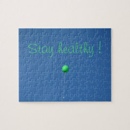 Puzzle Mantente sano con globo verde en el cielo