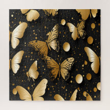 Mariposa de confetti negro y dorado