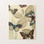 Puzzle Mariposas brillando sobre hojas<br><div class="desc">Si no sabes lo bonitas que son las mariposas,  esta pintura te ayudará a entender. Megan Meagher creó una hermosa interpretación de un grupo de mariposas deslizándose sobre hojas. ¡Una maravillosa pieza de arte a poner en tu casa!</div>