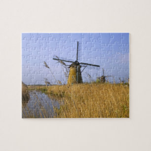 Puzzle Molinos de viento a lo largo del canal en Kinderdi