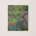 Puzzle Monet "The Iris Garden at Giverny"<br><div class="desc">Monet fue fundador de la pintura impresionista francesa, de la cual "El Jardín Iris de Giverny" (pintado entre 1899 y 1900) es un hermoso ejemplo. Es una celebración de color, luz y movimiento. Cuando Monet compró la finca de Giverny, rediseñó el jardín de flores ya plantado en sus jardines. Su...</div>