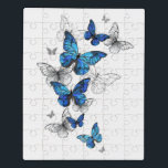 Puzzle Morfo de las mariposas voladoras azules<br><div class="desc">Morfo de las mariposas azules voladoras y mariposas blancas en un fondo abstracto y claro. Morfo. Diseño con morfo de mariposas azules.</div>