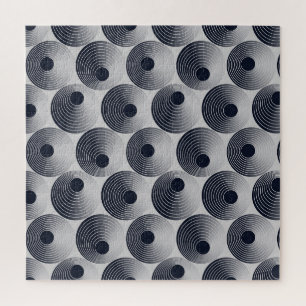 Puzzle Mosaico plateado-negro: textura de anillos concént