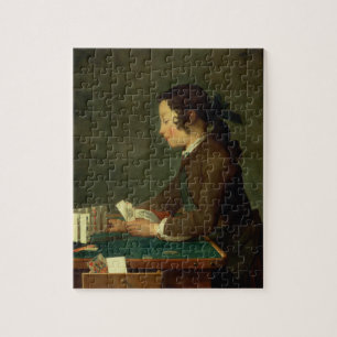 Puzzle Muchacho que construye un castillo de las tarjetas