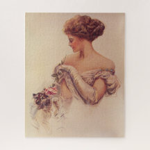 Mujer bonito sosteniendo un gatito (por Harrison F