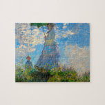 Puzzle Mujer Monet Paraguas Impresionismo<br><div class="desc">La obra maestra del impresionismo de Claude Monet - Mujer con un paraguas fue pintada por el impresionista francés Claude Monet en 1875. Muestra a una mujer con un paraguas y un niño pequeño, que es Madame Monet y su hijo. Esta pintura impresionista es una de las famosas pinturas de...</div>