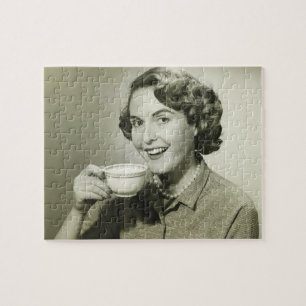 Puzzle Mujer que sostiene las tazas