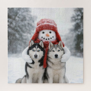 Puzzle Muñeco de nieve abrazando perros Husky Siberiano
