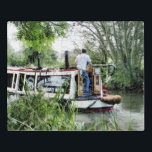 PUZZLE NARROWBOATS<br><div class="desc">Diseño artístico de un hombre que conduce su bote estrecho a lo largo del canal. Los barcos del canal, conocidos en el Reino Unido como barcos estrechos, se utilizaron originalmente para transportar mercancías por todo el país. Ahora se utilizan principalmente para el ocio y atraen a personas de todo el...</div>