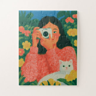 Puzzle Niña con cámara y gato en el jardín