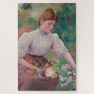 Puzzle Niña recogiendo flores en un jardín de verano