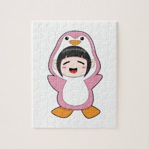 Puzzle Niño con traje de pingüino