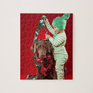 Puzzle Niño pequeño que adorna un perro