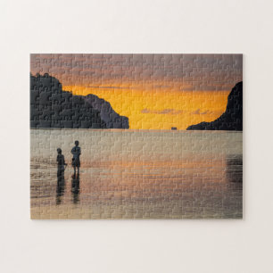 Puzzle Niños pescando al atardecer