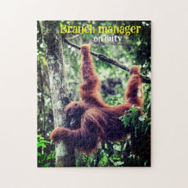 Puzzle Orangután colgando de un árbol