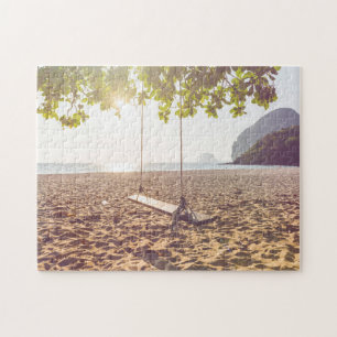 Puzzle Oscilación en la playa en la puesta del sol