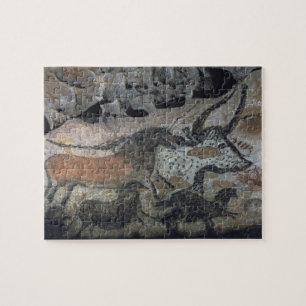 Puzzle Oscile la pintura de un toro y de los caballos,