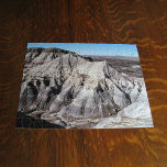 Puzzle Paisaje desierto Blue Mesa Badlands Foto<br><div class="desc">Las altas montañas del desierto de las tierras áridas de Blue Mesa en el Parque Nacional del Bosque Petrificado cerca de Holbrook, Arizona cuentan con capas de roca multicolor. Las montañas tienen muchas grietas y trapos llenos de sombras que muestran la textura de las formaciones rocosas. Un cielo azul claro...</div>