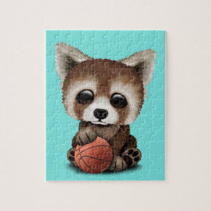 Puzzle Panda roja del bebé lindo que juega con baloncest