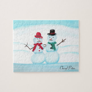 Puzzle Pareja de personas de nieve saludando con la mano,