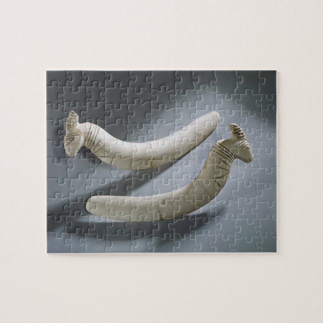 Puzzle Pares de castañuelas, período de Thinite (Horizontal)