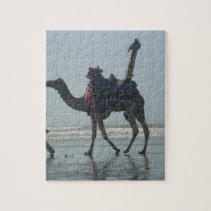 Puzzle Paseo Tribal en Camello: Arenas y Mar de la Marea
