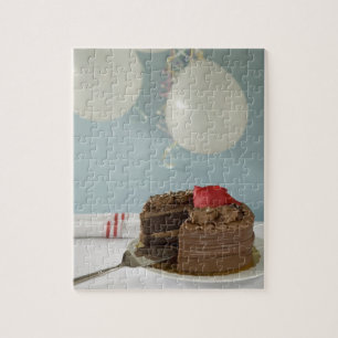 Puzzle Pastel de chocolate con una rebanada perdida en la