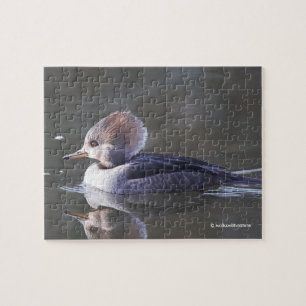 Puzzle Pato de una mercader encapuchada en el estanque