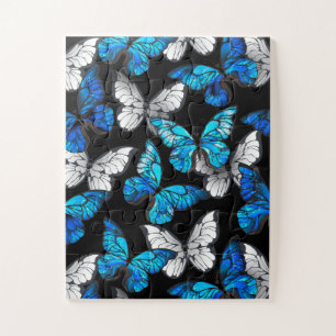 Puzzle Patrón oscuro sin foco con mariposas azules morfo